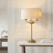 Hixson 3 Light Natural Fabric Table Lamp In Vintage Brass